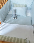 Protector de cuna lino rayado gris verdoso